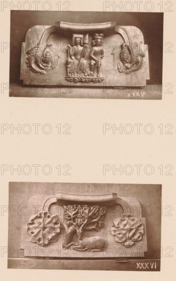 Two wood carvings in Worcester Cathedral, page, photomechanical print, Above a spinning woman and man between two mythical creatures, below a deer between two leaf motifs., number: 'XXXV, XXXVI', c. 1863 - in or before 1873, paper, Woodburytype, height 306 mm x width 244 mm, interior of church, spinning (manufacture of yarn), hoofed animals: stag, carving, applied arts, The image shows two separate rectangular wooden panels photographed one above the other on a light background; the upper panel features a carved central scene of two seated human figures under a curved handle with carved winged faces flanking each side, while the lower panel displays a carved reclining deer beneath a stylized tree with large ornamental leaves on either side and a curved handle above.