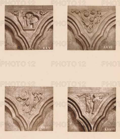 Four woodcarvings in an arcade of Worcester Cathedral, page, photomechanical print, Top left a bishop with a model of a church, top right a figure fighting a serpent, bottom left a rooster and a fox, bottom right the Annunciation., number: 'XXV, XXVIII', c. 1863 - in or before 1873, paper, Woodburytype, Woodburytypie, height 305 mm x width 244 mm, interior of church, the Annunciation: Mary standing, carving, applied arts, patron handing over model of church (or chapel), Four close-up photographs of carved stone arch decorations arranged in a two-by-two grid on a pale background; each photograph shows a pointed arch profile with layered moldings and a carved triangular spandrel above the arch. The top-left photograph depicts a carved scene with a robed figure standing beside architectural forms and a rectangular element, flanked by ornamental details and sculpted foliage at the upper corners. The top-right photograph shows a carved figure kneeling or leaning with flowing drapery amidst ...