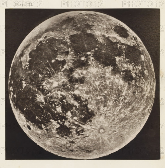 Full Moon, page, photomechanical print, number: 'Plate III.', photographer: Warren de la Rue, Europe, cliché maker: Séraphin-Médéric Mieusement, United Kingdom, c. 1870 - in or before 1873, paper, Woodburytype, Woodburytypepie, height 153 mm x width 157 mm, Print for page 53., Moon, A large circular object fills the center of the image, showing a textured surface with many irregular light and dark patches, circular depressions, and streaked patterns; the object's upper edge curves into a dark background and its lower edge tapers into the same dark area, with a narrow light border framing the whole scene.