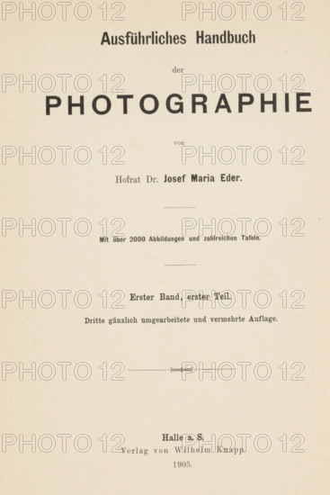 Geschichte der Photographie, book, writer (clerical worker): Josef Maria Eder, publisher: Wilhelm Knapp, Halle an der Saale, 1905, writer (clerical worker), Saxony-Anhalt, pasteboard, paper, printing, car type, height 245 mm x width 168 mm x thickness 30 mm, A cream-colored page with centered black printed headings and lines, featuring a large bold word in uppercase near the top, smaller bold and regular text lines above and below it, thin horizontal rules separating sections, and a decorative short horizontal ornament near the lower middle; the paper shows slight speckling and uneven discoloration.