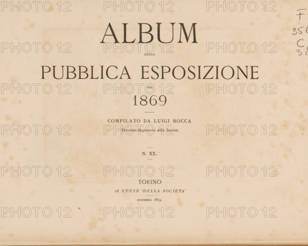 Album della pubblica esposizione del 1869, book, compiler (person in literature): Luigi Rocca, 1869, compiler (person in literature), textile materials, pasteboard, paper, linen (material), printing, albumen print, engraving, height 226 mm x width 303 mm x thickness 10 mm, A faded, cream-colored page with dark serif headings arranged vertically, showing a large centered word at the top, a line of smaller centered text beneath it, a wide uppercase phrase across the upper middle, and a prominently centered numeral below that, all printed in a dark ink; the page has visible age spots and scattered brown foxing marks, faint horizontal creases, and a narrow handwritten sequence in the right margin; additional smaller centered lines of printed text appear below the numeral, and the lower half of the page is mostly blank with a few isolated stains.