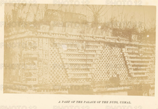 A part of the palace of the nuns, Uxmal, photograph, page, c. 1870 - in or before 1880, photographer, North America, paper, albumen print, height 91 mm x width 151 mm, ruin of a dwelling, house, castle, palace, A faded photograph of a stone structure with a patterned facade composed of lattice-like blocks and horizontal stone slabs, showing carved decorative elements along one corner and layered masonry at the base, with sparse vegetation and thin tree trunks rising behind the structure and a pale circular blemish on the surface of the image.
