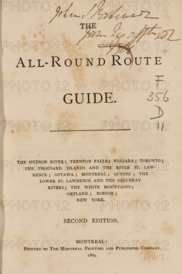 All-round route guide, book, inscription: 'John S Ro... from Lis ...', publisher: Montreal Printing and Publishing Company, Montreal, 1869, North America, pasteboard, biological material, paper, leather, printing, albumen print, height 160 mm x width 109 mm x thickness 15mm, A vertical aged book page with a faded cream background and scattered brown spots, showing a large centered title in dark serif type near the top, ink signatures and scribbles across the upper edge, a thin horizontal line below the title, handwritten pencil marks at the right margin, a block of smaller printed lines of text arranged in centered rows in the middle section, and a single-word line in larger type followed by another centered line of small printed text near the lower third, with the paper edges slightly darker and a faint curved crease on the right side.