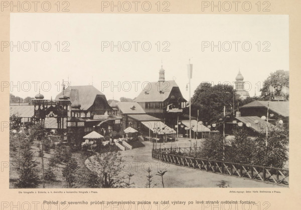 Pohled od severniho pruceli prumyslového paláce na cást výstavy po levé strane svetelné fontány, View of the Výstavište in Prague, page, photomechanical print, Výstavište, cliché maker: Carl Bellmann, Prague, c. 1888 - in or before 1893, photographer, paper, collotype, photoprint, height 166 mm x width 262 mm, temporary exhibition, 'Salon', A sepia-toned scene of a park-like exhibition area with ornate wooden pavilions and buildings featuring steep roofs, turrets, and decorative cupolas; a fenced pathway curves in the foreground past trees and shrubs toward a cluster of structures with awnings and canopied seating; poles topped with round lanterns or globes line parts of the area and hang between buildings; a taller tower with a domed top and layered sections rises behind trees on the right; people are visible as small figures near the seating and walkways; surrounding foliage and planted evergreens frame the scene.