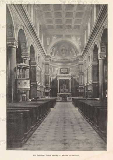 Ant. Barvitius: Vnitrek basiliky sv. Václava na Smichove, Interior of the Church of St. Wenceslas in Prague, page, photomechanical print, Church of St. Wenceslas, cliché maker: Carl Bellmann, Prague, c. 1891 - in or before 1895, photographer, Sint-Wenceslauskerk, paper, autotype, autotypie, height 262 mm x width 180 mm, parts of church interior: aisle, A long central aisle with a patterned floor leads toward an elevated altar area framed by columns and a rounded apse with frescoed imagery; rows of wooden pews line both sides of the aisle; tall stone columns and arched arcades run along the nave, featuring decorative capitals and panelled walls with framed panels and reliefs; a pulpit with an ornate canopy projects from the left side; high coffered ceiling extends above, and the lighting appears even and muted throughout the interior.