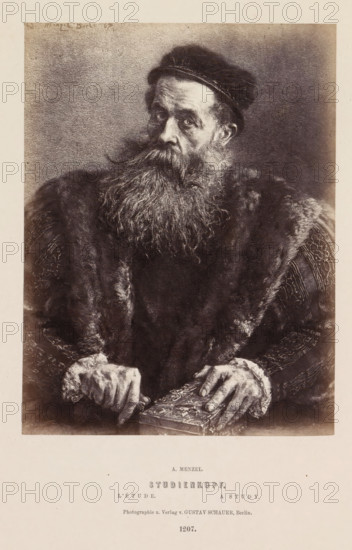 Studienkopf, Photographic reproduction of a portrait of an unknown man with a beard by Adolf Menzel, photograph, reproduction, page, number: '1207.', photographer: Gustav Schauer, Berlin, after painting by Adolph Menzel, c. 1858 - in or before 1868, paper, albumen print, albumendruk, height 173 mm x width 131 mm, adult man, beard, A monochrome portrait of an older man shown from the waist up wearing a dark fur-lined cloak and a cap, his long, full beard and mustache flowing over his chest, his eyes looking slightly to the side, his hands resting on an ornately decorated book, with textured fabric visible on his sleeves and a plain background surrounding him.