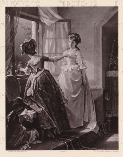 Photo reproduction of a painting of a bride being dressed by another woman, Brautschmückung, reproduction, page, photomechanical print, maker: G.-Grote'sche Verlagsbuchhandlung, after painting by Arthur Georg von Ramberg, c. 1874 - in or before 1884, G.-Grote'sche Verlagsbuchhandlung, Arthur Georg von Ramberg, photographer, after painting by, paper, collotype, photoprint, height 201 mm x width 158 mm, dressing the bride, A grayscale image shows an interior scene with two women in period dresses near a window with flowing curtains; one woman stands facing slightly toward the viewer wearing a light-colored gown with ruffled sleeves and a floral headpiece, her hand resting on the bodice and the other hand hanging by her side, while the other woman, seen from behind and turned toward the open window, wears a darker patterned skirt with a fitted bodice and a bonnet adorned with ribbons and bows, her arm extended toward the windowsill where small flowers are visible; a carved chair and drape...