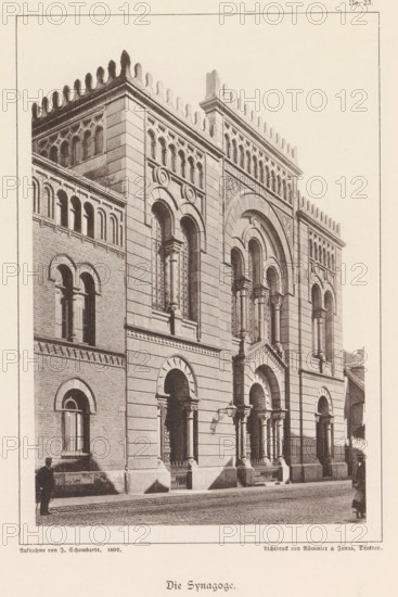Exterior of the Neue Synagoge te Braunschweig, Die Synagoge, Braunschweig's Baudenkmäler, page, photomechanical print, number: 'No. 23.', photographer: J. Schombardt, Braunschweig, cliché maker: Römmler & Jonas, Dresden, publisher: Benno und Wilhelm Danert Goeritz, 1892, J. Schombardt, Römmler & Jonas, Benno und Wilhelm Danert Goeritz, photographer, cliché maker, publisher, Lower Saxony, Saxony, paper, collotype, photoprint, height 160 mm x width 106 mm, the Synagogue (as building and place of worship, Jewish religion), façade (of house or building), Neue Synagoge (Braunschweig), A sepia-toned photograph of a large masonry building facade featuring ornate arched doorways and tall arched windows framed by columns and decorative stonework, with a patterned cornice and crenellated roofline along the top; the facade shows alternating smooth and rusticated stone blocks, carved circular and semicircular motifs above the arches, and recessed panels with intricate detailing; a wrought-iron fen...