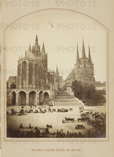 View of Erfurt Cathedral and St. Severus Church, Der Dom und die Kirche St. Severi, photograph, page, number: '2', Erfurt (city), c. 1858 - in or before 1868, photographer, Thuringia, paper, albumen print, height 128 mm x width 103 mm, Image opposite page 8., square, circus, church (exterior), façade (of house or building), Erfurt Cathedral, A sepia photograph framed by a decorative border shows a large Gothic cathedral with tall pointed spires and intricate stone facades on the left and a church with three tall slender spires on the right, connected by a raised terrace and a broad flight of steps; beneath the terrace an arcade of rounded arches is visible, and a wide open square in front of the buildings contains numerous horse-drawn carriages and groups of people, with trees and smaller buildings along the right side and a pale sky above.