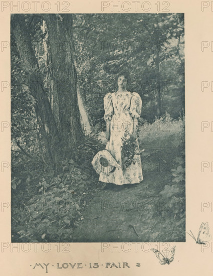 Woman in a forest with branches and a hat in her hands, page, photomechanical print, inscription: 'My Love is Fair', photographer: Mary Bartlett, United States of America, cliché maker: anonymous, c. 1884 - in or before 1894, North America, paper, photoaquatint, height 161 mm x width 123 mm, head-gear: hat, adolescent, young woman, maiden, forest, wood