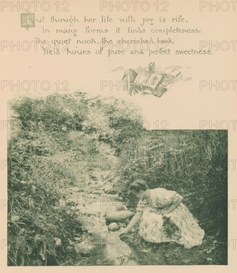 Woman crouching by a stream, page, photomechanical print, photographer: Mary Bartlett, United States of America, cliché maker: anonymous, c. 1884 - in or before 1894, North America, paper, photoaquatint, height 138 mm x width 170 mm, adolescent, young woman, maiden, brook, A faded photographic print shows a woman in a patterned dress seated at the edge of a shallow stream, leaning forward with one hand reaching toward the water while rocks and pebbles border the stream; tall grasses and dense foliage surround the waterway and extend into the background, and above the scene a decorative sketch of an open book rests near the top margin.