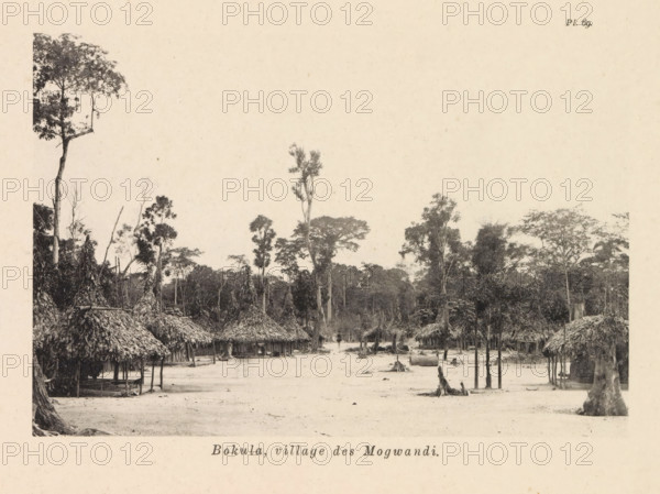 Houses in Bokula, Bokula, village des Mogwandi, page, photomechanical print, number: 'Pl. 69.', photographer: Franz Thonner, cliché maker: Stengel & Markert, Dresden, 1896, Saxony, paper, collotype, light printing, height 108 mm x width 161 mm, housing, façade (of house or building), A wide clearing bordered by dense trees fills the scene, with a series of thatched huts arranged along the edge of the open ground. The huts have conical, textured roofs made of layered plant material and open-sided walls supported by vertical posts, some showing raised platforms beneath the roofs. Scattered tree stumps and upright trunks rise from the sandy or bare earth of the clearing, while taller trees with leafy canopies frame the background and tower above the huts. The overall image is monochrome and shows a natural forest edge transitioning into a simple village area with visible trunks, branches, and clustered foliage.