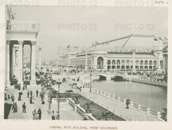 Liberal Arts Building, from colonnade, View of the building for technology and liberal arts at the World's Columbian Exposition in Chicago in 1893, page, photomechanical print, number: 'Plate 21', photographer: Charles Dudley Arnold, Chicago, photographer: HD Higinbotham, clichémaker: anonymous, 1893, Charles Dudley Arnold, HD Higinbotham, photographer, clichémaker, North America, Illinois, paper, collotype, photogravure, height 134 mm x width 191 mm, world fair, world exhibition, World's Columbian Exposition, A wide view of a waterfront scene with a large classical building featuring tall columns and arched windows, ornate cornices, and a sloped roof with flagpoles; a broad promenade lined with lampposts, potted plants, and balustrades runs alongside the water where a stone bridge with sculptural figures spans the channel; numerous people in period clothing walk along the promenade and gather near the colonnade, some holding umbrellas; decorative statues and columns punctuate the open...