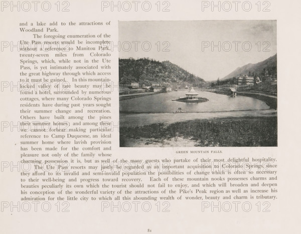 View of Green Mountain Falls in Colorado, Green Mountain Falls, page, photomechanical print, cliché maker: New York Photo-Gravure Company, New York (city), c. 1888 - in or before 1893, photographer, North America, Colorado, El Paso (Colorado), paper, autotypie, height 99 mm x width 125 mm, city-view in general, 'veduta', dale, valley, A page from a printed book shows a rectangular black and white photograph of a lake with a small island pavilion in the center, surrounded by water and a shoreline with grass and gentle slopes, backed by tree-covered hills and mountains; several small buildings and a larger multi-story building sit near the water and along the hillside, and a few docks and boathouses are visible at the water's edge, all framed by the book's margins and blocks of printed text on the left and below.