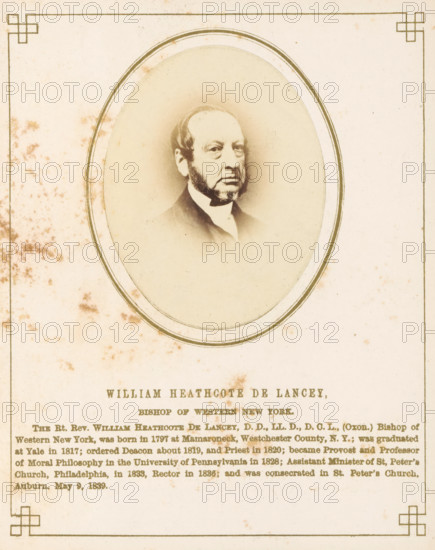 Portrait of William Heathcombe De Lancey, photograph, page, inscription: 'William Heathcombe De Lancey, Bishop of Western New York, ', photographer: J. Gurney & Son, in or after 1861-10-16 - in or before 1861-10-20, Jeremiah Gurney & Son, paper, albumen print, height 70 mm x width 53 mm, Person, William Heathcote De Lancey, historical persons, A faded sepia portrait of an older man with sideburns and a high-collared shirt appears centered inside an oval frame with decorative double borders, set on a mottled cream paper background that shows age spots and foxing. The page is bordered by a thin rectangular line with small geometric corner embellishments, and dense printed text is visible below the oval but not described. The portrait area has a soft vignette effect blending into the oval, and the overall image shows slight discoloration and stains scattered across the paper.