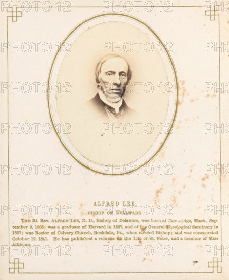 Portrait of Alfred Lee, photograph, page, inscription: 'Alfred Lee, Bishop of Delaware, ', photographer: J. Gurney & Son, in or after 1861-10-16 - in or before 1861-10-20, Jeremiah Gurney & Son, paper, albumen print, albumendruk, height 70 mm x width 53 mm, Person, Alfred Lee, historical persons, An aged, sepia-toned portrait of a man with a narrow face, receding hairline, and sideburns set inside an oval frame centered on a pale rectangular page with decorative corner motifs, a thin double-lined border around the oval, and scattered brownish foxing stains across the page.
