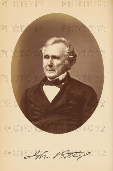 Portrait of John Sterrett Gittings, John S. Gittings, photograph, page, photographer: Bendann Bros., c. 1866 - in or before 1871, paper, albumen print, height 147 mm x width 113 mm, Person, John Sterrett Gittings, historical persons, An oval sepia portrait of an older man shown from the chest up, with light wavy hair, a high forehead, and visible facial lines; he wears a dark formal jacket and a white shirt with a bow tie, and his gaze is directed slightly to one side against a plain darker background, framed by a lighter margin around the oval.