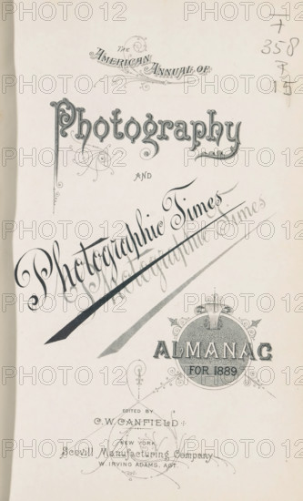 The American annual of photography and photographic times almanac for 1889, book, editor (person who revises): CW Canfield, publisher: Scovill Manufacturing Company, New York (city), 1889, editor (person who revises), North America, textile materials, paper, linen (material), printing, photochemical processes, photoaquatint, autotype, daylight gelatin silver print, gelatin silver print, collotype, developing gelatin silver print, height 231 mm x width 155 mm x thickness 31 mm, A vertical page with ornate decorative lettering and swirling embellishments arranged in a formal title layout, featuring a large stylized word near the top with elaborate flourishes and textured fill, a diagonal calligraphic phrase slanted across the center with a bold sweeping stroke beneath it and faint overlapping shadowing, a circular ornamental emblem toward the lower right with decorative scrollwork and a textured interior, slender filigree accents and curving lines scattered around the composition, and a ...