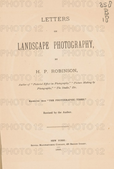 Letters on landscape photography, book, writer (clerical worker): Henry Peach Robinson, publisher: Scovill and Adams, New York (city), 1888, writer (clerical worker), North America, pasteboard, paper, textile materials, printing, photoaquatint, height 236 mm x width 155 mm x thickness 19 mm, A vertically oriented aged book page with a cream background and visible paper texture, showing a centered layout of printed lines and short passages in various serif typefaces, with a narrow horizontal rule near the middle and a small handwritten notation in pencil near the upper right edge, plus faint circular discoloration rings and small scattered spots across the surface.