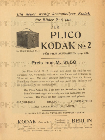 Reproduction of a landscape painting, reproduction, page, photomechanical print, photographer: Heinrich Kühn, cliché maker: anonymous, 1897, 1897 - in or before 1901, paper, autotype, height 69 mm x width 178 mm, landscapes, The image shows a vertically oriented aged paper page with printed text in a dark serif font and a small detailed illustration of a boxy camera with a handle and twin circular openings, positioned near the upper left. The paper has a warm beige tone with slightly darker edges and small flecks and spots. The layout includes large bold headings centered across the page and several paragraphs of smaller text beneath, with horizontal rule lines separating sections. Near the bottom there is a wider bold word set apart from surrounding text, and the overall appearance suggests a vintage advertisement or catalog page.