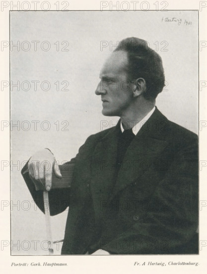Portrait of Gerhart Johann Robert Hauptmann, Porträt: Gerh. Hauptmann, page, photomechanical print, photographer: Aura Hertwig, cliché maker: anonymous, 1901 - in or before 1903, 1901, paper, autotypie, height 169 mm x width 131 mm, Print on fourth unnumbered page after page 234., Person, Gerhart Hauptmann, historical persons, A black-and-white portrait of a man shown in profile facing left, wearing a dark suit jacket and a white-collared shirt, with his right arm resting on the back of a wooden chair and his hand gripping the top of the chair, his hair combed back and his expression neutral, set against a light, plain background.
