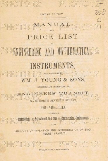 Interior of a room with mathematical instruments, Rear portion graduating room of Wm. J. Young & Sons, photograph, page, Philadelphia, c. 1870 - in or before 1875, photographer, North America, paper, albumen print, height 124 mm x width 206 mm, Photo opposite title page., calculating-instruments, A vertically oriented aged paper page with printed lines of large serif text arranged in centered lines from top to bottom, featuring a faded beige background and darker printed ink that appears worn in places, slight brown spotting and discoloration around the edges, and a vertical handwritten marking in dark ink near the upper right margin.