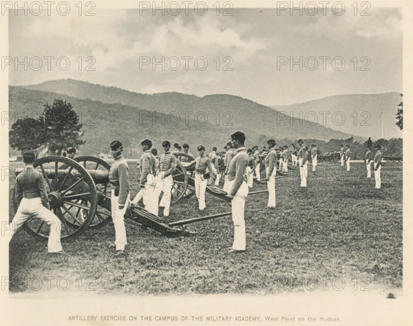Artillery exercise on the campus of the Military Academy, West Point on the Hudson, Exercise with cannons at the United States Military Academy at West Point, page, photomechanical print, West Point, c. 1883 - in or before 1893, North America, paper, collotype, photoprint, height 140 mm x width 190 mm, firearms: cannon, military academy, A sepia-toned outdoor scene shows uniformed men standing beside large wheeled cannons on a grassy field with rolling tree-covered hills in the background and a cloudy sky above; the men wear dark caps and lighter jackets with light-colored trousers and are positioned in a line near the artillery pieces while trees appear at the edges of the field.