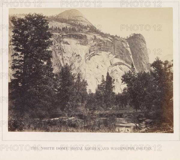 The North Dome, Royal Arches and Washington Column, View of the North Dome, the Royal Arches and the Washington Column in the Yosemite Valley, photograph, page, number: 'XII.', photographer: Carleton E. Watkins, Yosemite Valley, c. 1860 - in or before 1868, North America, California, paper, albumen print, height 155 mm x width 207 mm, mountains, rock-formations, dale, valley, A sepia-toned landscape photograph showing a large granite dome and cliff face rising behind a foreground of dense trees and a reflective river, with tall conifer and broadleaf trees silhouetted against the rock, exposed smooth and striated stone surfaces on the cliff, scattered small trees and shrubs on ledges, a calm waterway with fallen branches and a grassy riverbank, and a pale sky above.