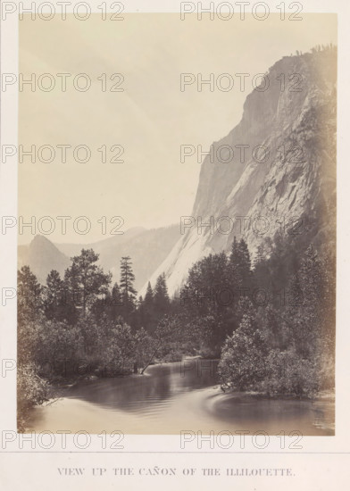 View of the Illilouette in the Yosemite Valley, View up the Cañon of the Illilouette, photograph, page, number: 'XV.', photographer: Carleton E. Watkins, Yosemite Valley, c. 1860 - in or before 1868, North America, California, paper, albumen print, height 206 mm x width 155 mm, river, mountains, rock-formations, dale, valley, A sepia-toned landscape photograph showing a river in the foreground with smooth reflective water and gentle ripples, flanked by dense trees and shrubs along its banks, a leaning tree extending over the water, and a variety of coniferous trees rising behind the riparian vegetation; beyond the trees a steep, rugged rock face dominates the right side of the image with visible striations and textured rock surfaces, while lower, more distant hills and a rounded rocky outcrop recede into a hazy sky that fills the upper portion of the picture.