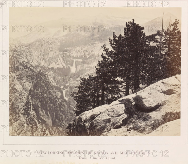 View of the Yosemite Valley with Nevada Falls and Merced Falls from Glacier Point, View looking towards the Nevada and the Merced Falls, from Glacier Point, photograph, page, number: 'XXII.', photographer: Carleton E. Watkins, Glacier Point, c. 1860 - in or before 1868, North America, California, Yosemite Valley, paper, albumen print, height 155 mm x width 206 mm, waterfall, mountains, rock-formations, dale, valley, A sepia-toned landscape photograph showing a mountainous valley with rocky cliffs and ridges receding into the distance, a narrow waterfall dropping between cliffs in the midground, and a foreground of large textured boulders and dense evergreen trees with visible branches and needles partially covered in light patches.