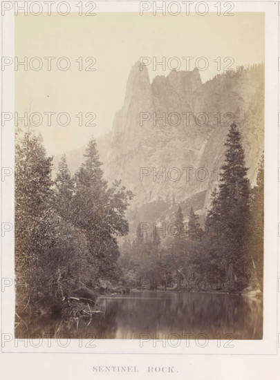 Sentinel Rock, View of Sentinel Rock in Yosemite Valley, photograph, page, number: 'IX.', photographer: Carleton E. Watkins, Yosemite Valley, c. 1860 - in or before 1868, North America, California, paper, albumen print, height 205 mm x width 156 mm, mountains, rock-formations, dale, valley, A tall, jagged granite rock formation rises from a rugged mountainside, its steep faces textured with visible cracks and ledges, surrounded by forested slopes with conifer trees along the ridge and valley; in the foreground a calm river reflects the trees and rocky banks, with leafy shrubs and tree roots along the water's edge and a mix of taller evergreens and dense undergrowth framing the scene.