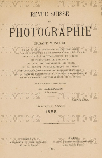 Revue suisse de photographie, Société genevoise de photographie ... et al., book, number: '194', annotation: 'Je. van Severen, Ruysselede', editor (person who revises): Eugène Demole, 1895, editor (person who revises), biological material, paper, leather, printing, collotype, photoaquatint, autotypie, agate marbled paper, scrotel marbled paper, height 230 mm x width 164 mm x thickness 27 mm, The image shows an aged, beige paper page with printed dark serif typography arranged in centered lines and blocks across the surface, including a large bold word near the top and smaller lines of evenly spaced words beneath, a decorative thin horizontal ornament near the middle, and two columns of text separated by a vertical rule toward the lower portion; the paper has a slightly mottled texture with small speckles and faint discoloration.
