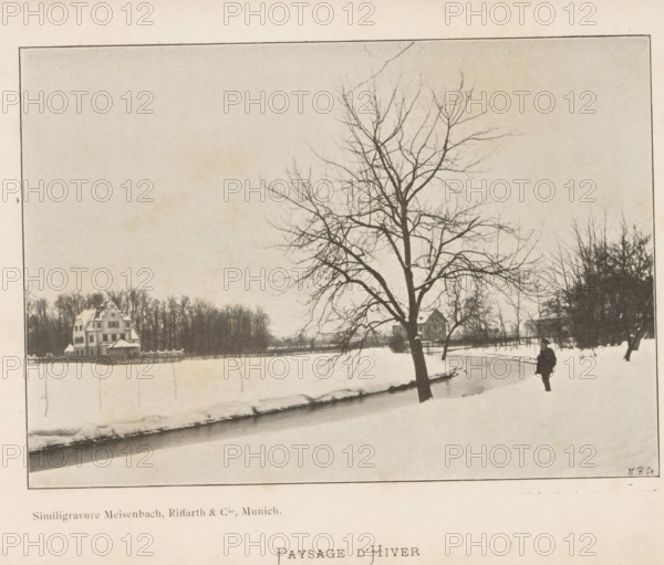 Paysage d'Hiver, Winter landscape, page, photomechanical print, cliché maker: Meisenbach, Riffarth & Cie., Munich, c. 1892 - in or before 1897, Meisenbach, photographer, cliché maker, Bavaria, paper, autotypie, height 100 mm x width 143 mm, snow, winter landscape, landscape symbolizing winter (the four seasons of the year), A snowy landscape framed by a thin dark border shows a frozen or snow-covered body of water with uneven snowbanks, a large leafless tree with many bare branches standing near the water, a person dressed in dark clothing walking along the snowy shore, a cluster of trees and shrubs in the background, and a multi-story house with a pitched roof partially visible among the trees.