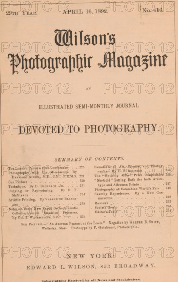 Wilson's photographic magazine, magazine, publisher: Edward Livingston Wilson, New York (city), 1892-04-16, Edward Livingston Wilson, publisher, North America, paper, printing, wood engraving, autotype, collotype, height 256 mm x width 176 mm x thickness 4 mm, The image shows a faded, sepia-toned page with ornate large blackletter headings near the top and a centered, bold serif line below, followed by several columns of smaller printed blocks and a thin ruled border around the page edges. The top area contains a narrow band with smaller text-like marks and a faint rectangular blemish near the upper right. The central area is dominated by wide empty space between the prominent headings and the denser printed blocks below. The lower half displays two columns of tightly set lines and small dots, with faint smudges and aging marks scattered across the paper, and a larger bold line near the bottom above a final centered line of larger serif type. The paper shows slight discoloration, creas...