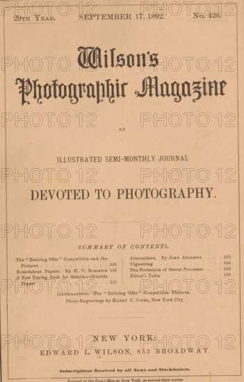 Wilson's photographic magazine, magazine, publisher: Edward Livingston Wilson, New York (city), 1892-09-17, Edward Livingston Wilson, publisher, North America, paper, printing, wood engraving, autotype, height 256 mm x width 175 mm x thickness 4 mm, A faded sepia-toned printed page with a decorative large title near the top in ornate blackletter-style lettering, centered on the page, followed by smaller lines of printed headings and a prominent bold centered slogan in uppercase serif type. There are thin rectangular border lines near the page edges and a series of narrow horizontal rules separating sections. Below the main area is a multi-column list of brief printed lines and dots aligned in columns with small gaps between columns, and lower on the page are centered lines of larger serif text separated by subtle rules, all on aged paper with light speckles and creases.
