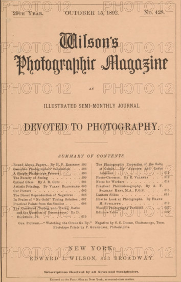 Wilson's photographic magazine, magazine, publisher: Edward Livingston Wilson, New York (city), 1892-10-15, Edward Livingston Wilson, publisher, North America, paper, printing, wood engraving, autotype, collotype, height 257 mm x width 178 mm x thickness 4 mm, A rectangular page with a light peach background framed by thin black lines, featuring ornate large dark gothic lettering near the top and several lines of smaller printed headings and columns below, a centered bold phrase in larger dark type midway down, two narrow columns of smaller printed lines and short paragraphs beneath that, decorative horizontal rules separating sections, and a wide line of bold type near the lower third above a final block of small printed lines at the bottom.