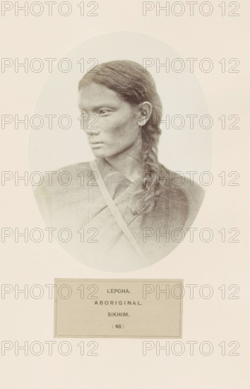 Portrait of an unknown woman from the Lepcha community of Sikkim, photograph, page, inscription: 'LEPCHA., ABORIGINAL., SIKHIM.', number: '(46)', photographer: Benjamin Simpson (possibly), Sikkim, c. 1858 - in or before 1868, paper, albumen print, height 160 mm x width 121 mm, human races, peoples, nationalities, A sepia-toned oval portrait of a person shown from the shoulders up facing left, with long dark hair braided over one shoulder, wearing a textured garment with a strap across the chest, set against a light background within a rectangular page.