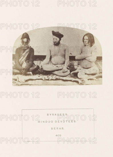 Portrait of three unknown men from the Bairagi community of the former Berar in central India, photograph, page, number: '403.', inscription: 'BYRAGEES., HINDOO DEVOTEES., BERAR.', photographer: James Mulheran (possibly), Berar, 1862, paper, albumen print, height 64 mm x width 95 mm, human races, peoples, nationalities, asceticism, Hinduism, Buddhism, Jainism, A sepia-toned photograph shows three seated people on a patterned cloth against a plain backdrop, each occupying a distinct position across the frame; the left person wears a patterned cap and layered garments with a draped cloth across the chest and has a beard and mustache, the central person is bare-chested with a turban and a beard, sitting cross-legged with hands resting in the lap while holding a string of beads, and the right person is bare-chested with shoulder-length hair, arms crossed over the chest, seated with legs folded.