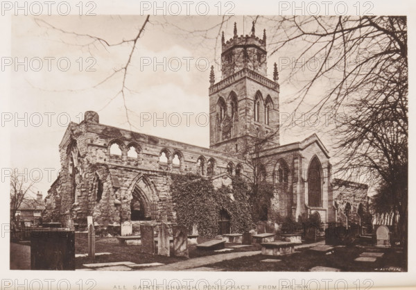 View of All Saints Church in Pontefract, All Saints Church, Pontefract from the SW, page, photomechanical print, Pontefract, cliché maker: Autotype Company, The, c. 1882 - in or before 1887, photographer, clichémaker, paper, collotype, photoprint, height 114 mm x width 177 mm, church (exterior), A sepia-toned photograph showing a stone church with a tall square tower topped by battlements and pinnacles, Gothic arched windows visible on the tower and the adjacent nave, and a partly ruined section with arched openings and rough stonework in the foreground; bare tree branches frame the top and right edges of the scene, ivy climbs parts of the exterior walls, and several weathered gravestones and flat stone slabs occupy the grassy churchyard in front.