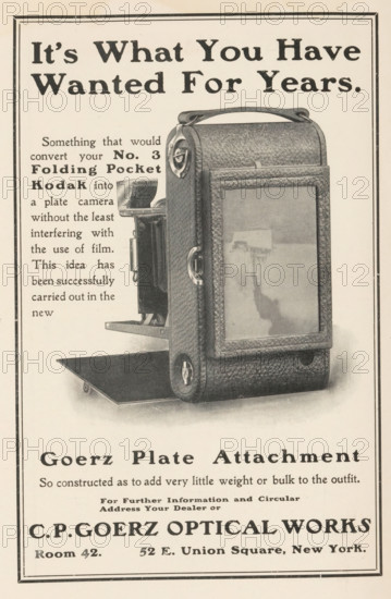 View of the back of a Kodak camera, page, photomechanical print, c. 1897 - in or before 1902, paper, autotype, height 108 mm x width 99 mm, Print in a section of advertisements at the back of a book. Print is part of an advertising message from CPGoerz Optical Works., camera, photography, A vertically oriented vintage advertisement showing a textured leather camera case with a handle and metal clasps partially open to reveal an inner camera mechanism and a folding platform, photographed against a light background with a double-lined border.