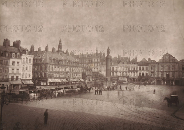 Vue du Monument Commémoratif, de la Défense de Lille en 1792, View of the column La Colonne de la Déesse on the Place de Général du Gaulle in Lille, in memory of the resistance against the Austrians in 1792, page, photomechanical print, inscription: 'Le Nord Contemporain, Revue Pittoresque', inscription: 'Érigé sur la Grand'Place de Lille, lors du Cinquantenaire du Siège', photographer: Lemercier, cliché maker: Ferrand, c. 1877 - in or before 1882-10-15, Lemercier, Ferrand, photographer, cliché maker, paper, Woodburytype, height 152 mm x width 213 mm, monument, statue, square, circus, Lille, A wide open cobblestone square bordered by rows of multi-story buildings with varied rooflines and ornate facades, a tall column topped by a standing statue rising near the center, horse-drawn carriages and groups of people gathered around the column and along the building fronts, a few individual figures walking in the foreground, tram tracks curving across the pavement, awnings over ground-level ...
