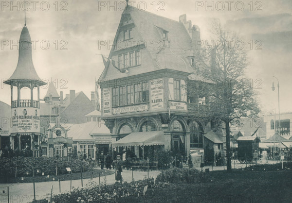 Zur Stadt Frankfurt, View of a reconstructed part of Frankfurt at the Antwerp World Exhibition in 1894, Exposition Universelle d'Anvers 1894, page, photomechanical print, photographer: Charles Bernhoeft, Antwerp, cliché maker: Charles Bernhoeft, Luxembourg (Belgian province), 1894, Charles Bernhoeft, photographer, cliché maker, paper, collotype, photoprint, height 153 mm x width 217 mm, Print on third unnumbered page after page 18., restaurant, civic architecture, edifices, dwellings, world fair, world exhibition, World Exhibition 1894 (Antwerp), Period, 1894-05-05 - 1894-11-05, A streetscape showing a large multi-story building with a steeply pitched roof and decorative timber framing, adjacent to a tower with a conical roof and open upper pavilion, a row of awnings and outdoor seating in front, several people standing and sitting near the entrance and under the awnings, ornamental windows and arched openings on the ground level, trees with bare branches beside the building, a lamp po...