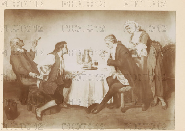 Photo reproduction of a painting of two people playing a card game where one is cheating by Willem Linnig (II), photograph, reproduction, page, photographer: Alexandre van Antro, after painting by Willem Linnig (II), c. 1891 - in or before 1896, paper, daylight collodion silver print, height 113 mm x width 163 mm, adult woman, adult man, card games, A sepia-toned scene of four people around a round table covered with a tablecloth, with a pitcher and drinking vessels on the table; two men sit opposite each other at the table, one leaning forward with a hand near the table and the other holding a bowl close to his face; a woman stands behind the seated man with her hands resting near his shoulders and wearing a cap and a dress with ruffled sleeves; another man sits to the side, leaning back and raising a long thin object toward his face; stools and a large jug are visible on the floor, and drapery and simple interior wall form the background.
