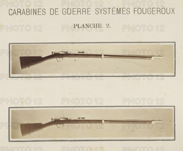 Two images of a rifle, photograph, page, number: 'Planche 2.', inscription: 'Carabines de guerres systèmes Fougeroux', photographer: Edouard Magis, Liège, c. 1857 - in or before 1867, paper, albumen print, height 253 mm x width 178 mm, Images in section at the back., firearms: rifle, A vertically oriented rectangular page shows two horizontal sepia-toned photographic panels each bordered by a double-lined frame, each panel containing a side view of a long wooden rifle with a dark stock, a metal barrel, and visible trigger and bolt components, the upper panel rifle positioned near the top third of the page and the lower panel rifle positioned nearer the middle, both set against a light neutral background with small blemishes and age spots on the page.