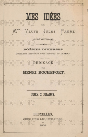 Portrait of Madame Veuve Jules Faure, photograph, page, annotation: 'A mon ami Auguste Pastois, souvenir., 27, 10, 79. V Jules Faure', address: 'Photographie L. Straszak, Rue Neuve, 9, Bruxelles.', photographer: Ladislas Straszak, Brussels (possibly), c. 1863 - in or before 1868, paper, albumen print, height 92 mm x width 55 mm, Photo opposite title page., Person, Veuve Jules Faure, historical persons, A vertically oriented aged paper page with a thin rectangular border and decorative marks at the corners, featuring multiple lines of typographic headings in bold and varied serif fonts centered on the page, separated by thin ornamental rules and small decorative flourishes; the layout shows larger bold title type near the top, medium decorative lettering below, a centered ornamental divider, further bold headings and smaller body text grouped beneath, an isolated thin horizontal line with wider bold text below it near the middle, and additional centered lines of smaller text and a short...
