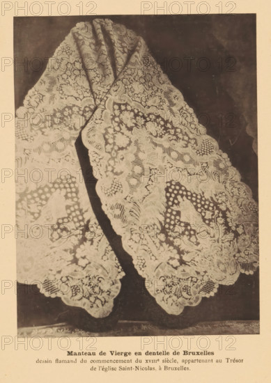 Coat with lace, Manteau de Vierge en dentelle de Bruxelles, Dentelles exposées au Palais de la Femme, a Chicago, page, photomechanical print, inscription: 'dessin flamand du commencement du XVIIIe siècle, appartenant au Trésor, de l'église Saint-Nicolas, à Bruxelles.', Chicago, c. 1888 - in or before 1893, North America, Illinois, paper, collotype, photoprint, height 148 mm x width 111 mm, lace, coat, cape, A close-up photograph of a delicate lace textile draped in two overlapping panels against a dark background, showing intricate floral and geometric patterns with scalloped edges and areas of openwork, the lace appearing light in tone against the darker backdrop and folded to reveal layered designs and ornamental motifs.