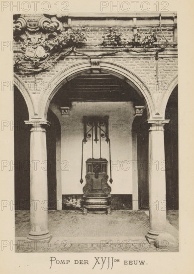 Fountain in the courtyard of the house of Christopher Plantin, Pump of the XVIIth century, page, photomechanical print, maker: Joseph Maes, c. 1881 - in or before 1886, paper, collotype, photoprint, height 160 mm x width 110 mm, Print on third unnumbered page after page 112., courtyard, ornamental fountain, A sepia-toned photograph of an architectural courtyard showing three arched openings supported by smooth round columns with simple capitals and bases, a brick wall above the central arch with decorative stonework and vines, and a suspended ornate iron fixture with curved elements hanging in front of a carved stone fountain or basin set against a plain wall, all viewed from a centered frontal perspective.