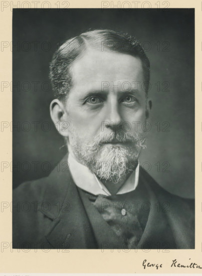 The right honorable Lord George Hamilton, photograph, page, annotation, inscription: '55. Baker St. London, W.', photographer: Elliott & Fry, London, c. 1893 - c. 1903, paper, carbon print, height 226 mm x width 170 mm, Person, Lord George Hamilton, historical persons (portraits and scenes from the life) ((full) bust portrait), A close-up black-and-white portrait of an older man showing his head and upper torso, with neatly combed hair and a full beard and mustache that are lighter in color than his hair, wearing a dark jacket over a vest and a high-collared shirt with a tie; the background is plain and darker than the subject, and a light border surrounds the photograph.