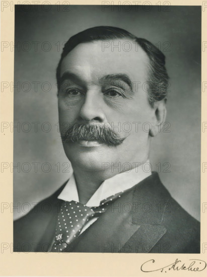 The right honorable Charles Thompson Ritchie, photograph, page, inscription: '263 Oxford St. London, W.', annotation, photographer: Herbert Rose Barraud, London, c. 1893 - c. 1903, paper, carbon print, height 228 mm x width 171 mm, Person, Charles Thomson Ritchie, historical persons (portraits and scenes from the life) ((full) bust portrait), A black and white portrait of an older man from the shoulders up showing a neatly combed dark hair, arched eyebrows, and a prominent curled mustache. His face shows fine wrinkles around the eyes and cheeks. He wears a high white collar, a dark polka-dotted necktie, and a dark suit jacket with a visible lapel. The background is plain and softly shaded, and there is a light border around the photograph.