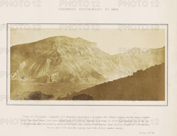 View of the Montaña de Guajara on Tenerife, Tenerife Experiment of 1856, photograph, page, number: 'Plate 1.', inscription: 'Portion of a Photograph (magnified 4.3 diameters), representing a mountain side (Mount Guajara, and the interior Southern wall of the Great Crater), four miles distance from the Camera, stationed at the height of 10, 700 feet above the level of the sea. (The apparently low, flat ground in the lower left hand corner, is part of the elevated Crater floor, at a height of 7, 000 feet above the sea, and 3, 500 above the ordinary level of the N. East summer clouds). See pp 513, 514.', photographer: Charles Piazzi Smyth, Tenerife, printer (person): JA Spencer (possibly), 1856, printer (person), paper, albumen print, height 100 mm x width 215 mm, Photo in the back section., experiment, test, science and technology, mountains, A sepia-toned photograph shows a rugged mountain landscape with layered ridges and steep rocky slopes, lighter-colored eroded rock faces and darker...